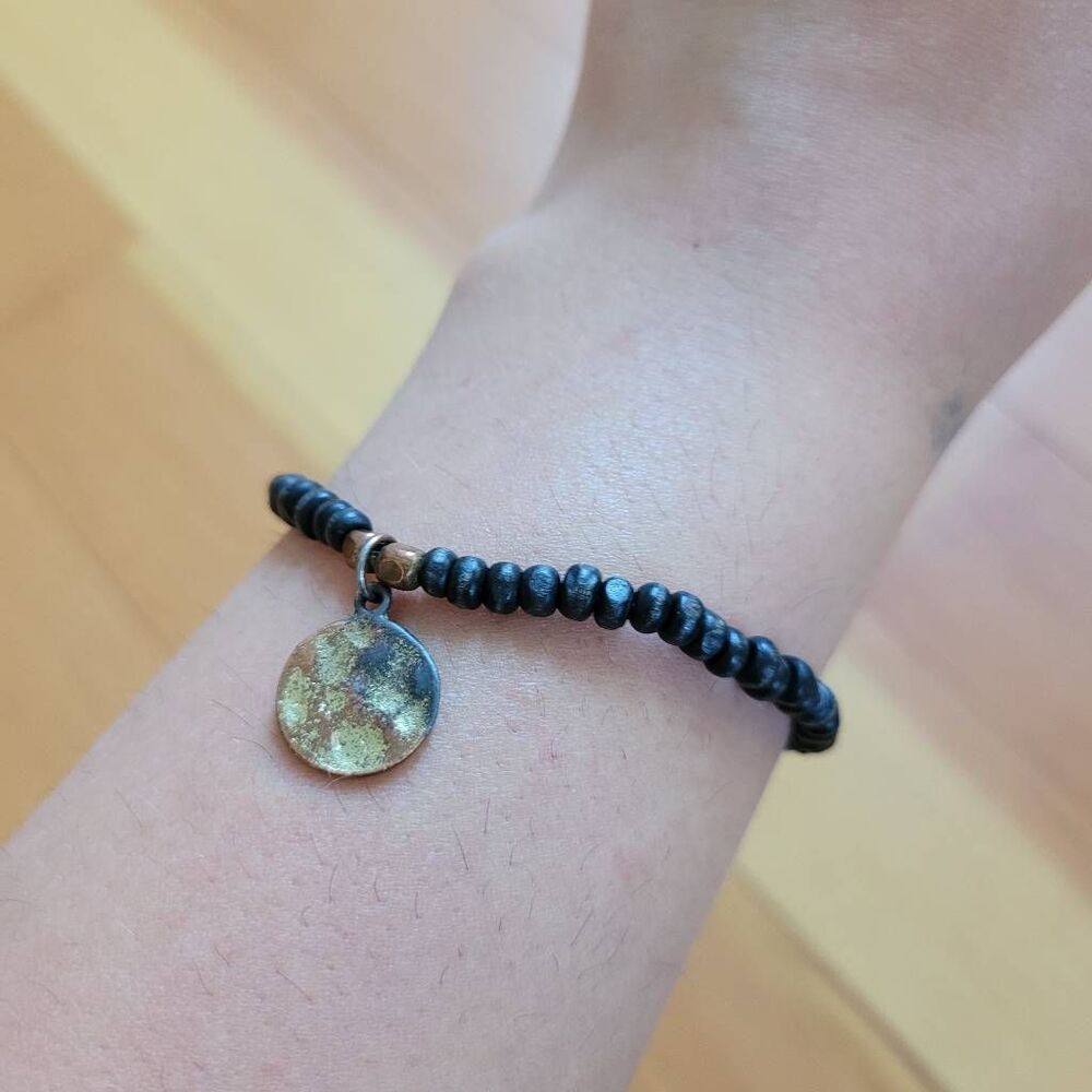 Black elastic beaded stretchy bracelet metal hammered charm boho goth indie